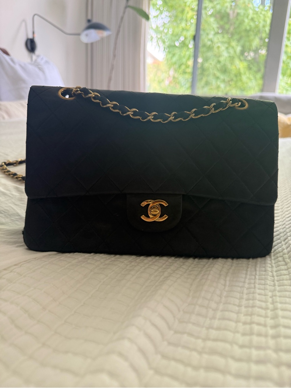 CHANEL Black Quilted Shoulder Bag with Gold Chain